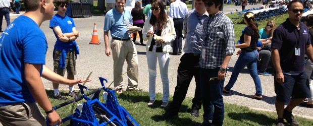 Andrew Torrance explains Overkill's hanging mechanism to NASA employees.