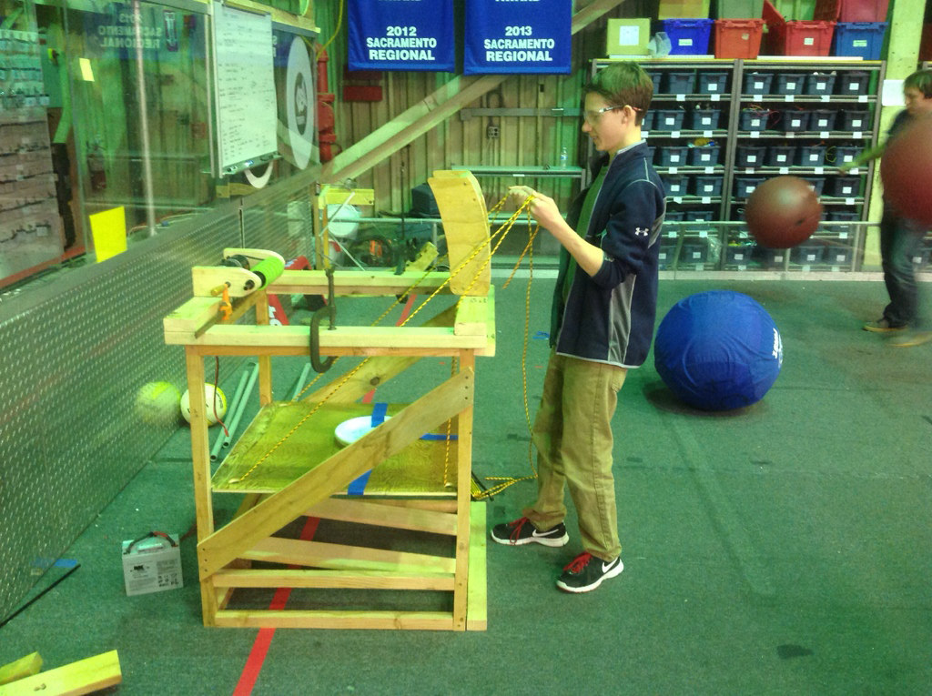 Josh testing the new elevator system with cables and frisbee