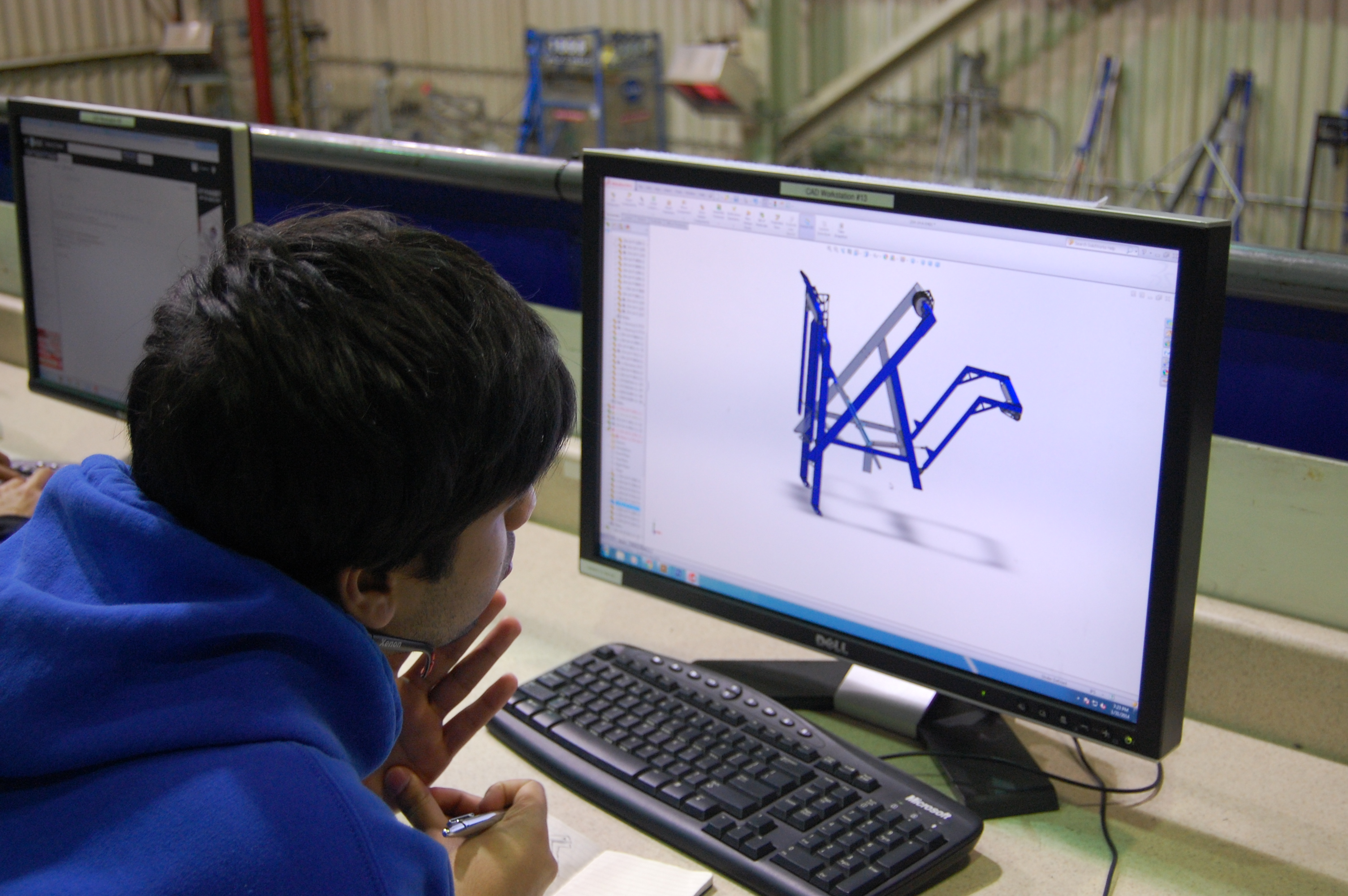 Student examining the superstructure CAD