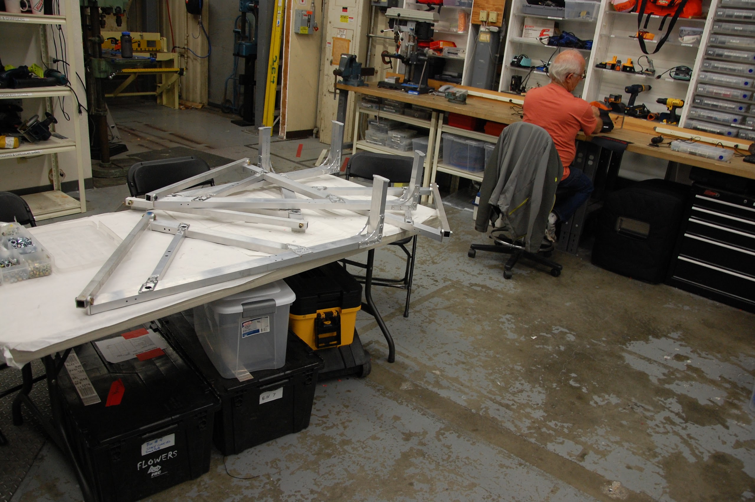 Superstructures lying on table, ready to be sent to welder