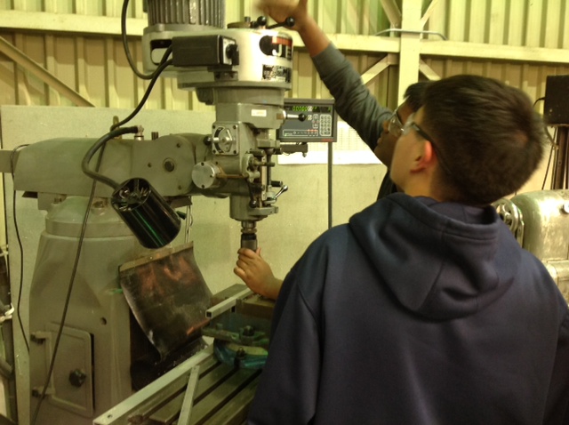 Godwin and Gregorio machining the temporary piece