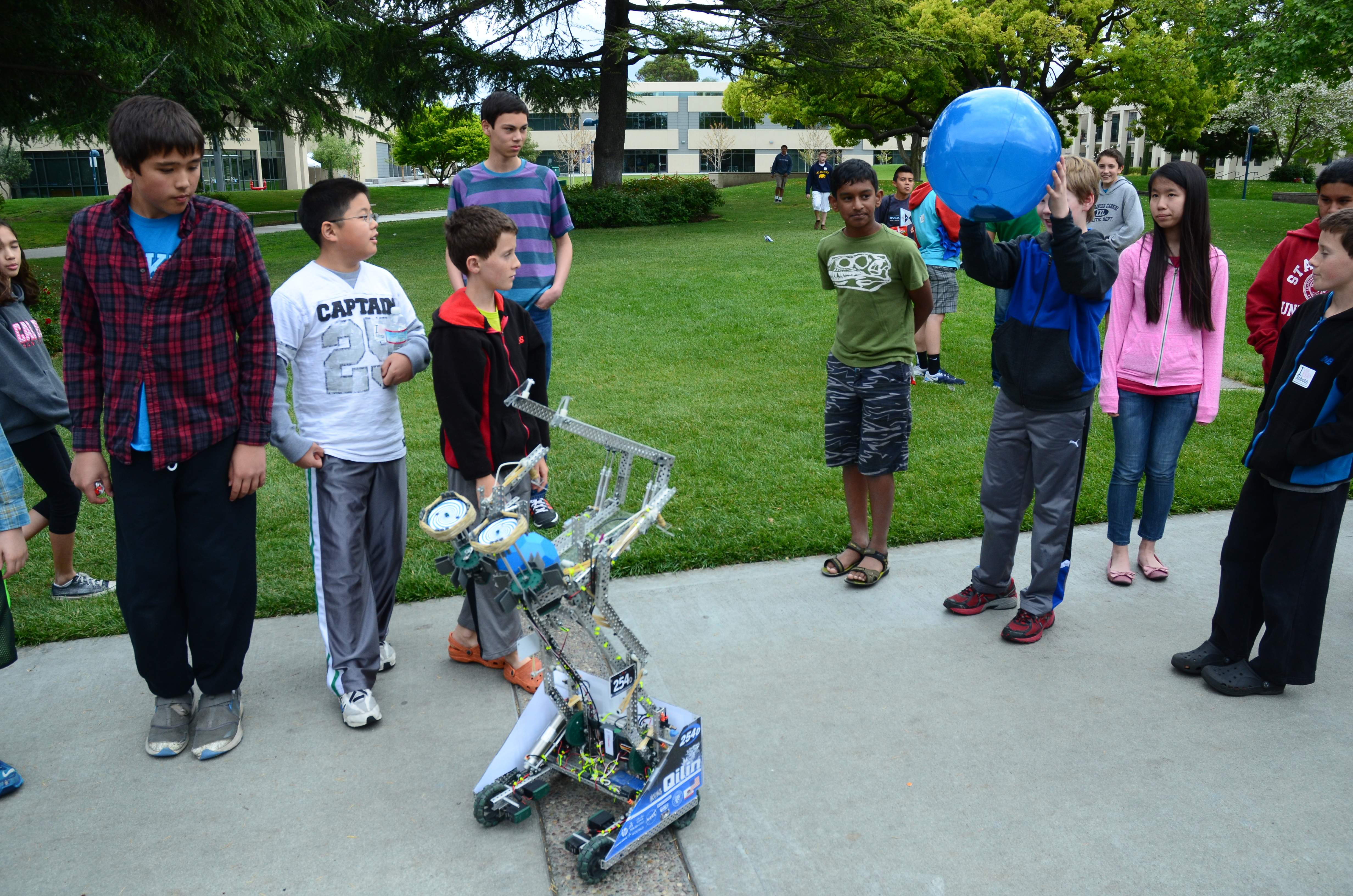 Eli demoing 254D VEX robot