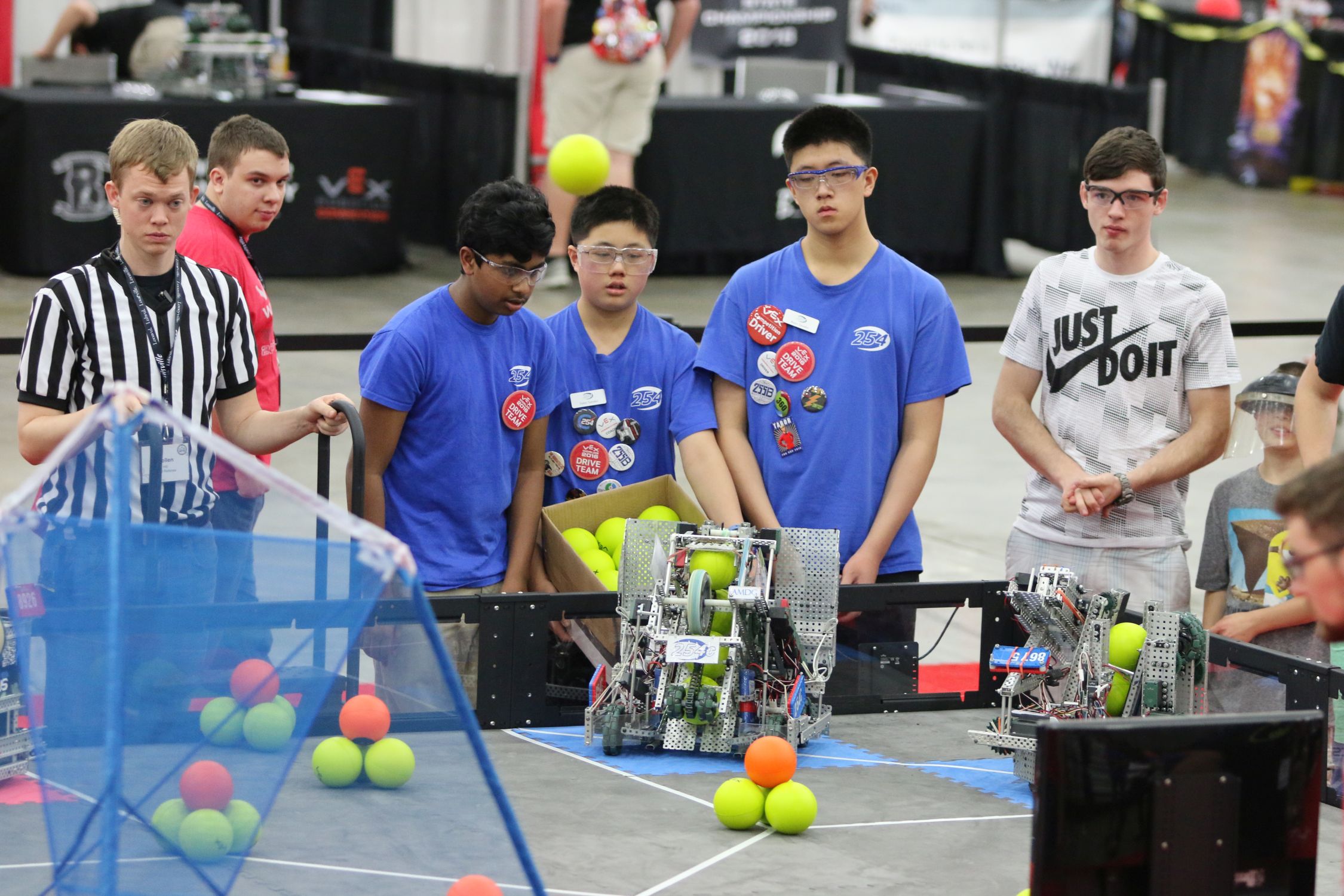 254C's drive team watches their robot perform during the autonomous period